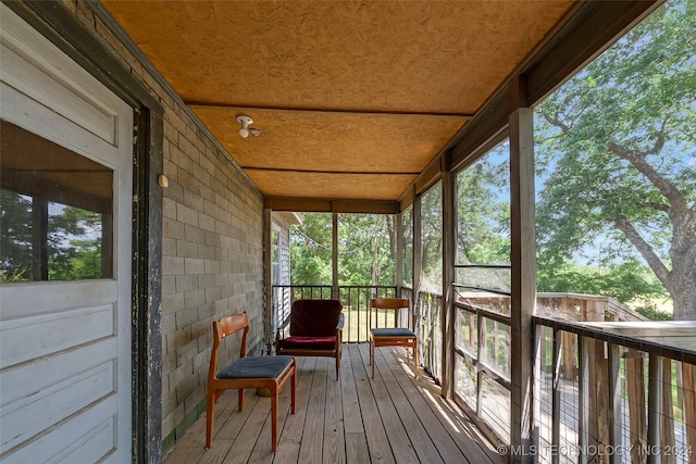 sunroom with wood ceiling