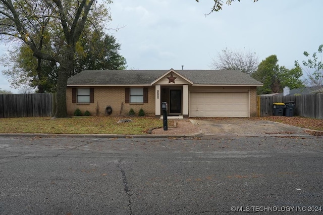 single story home with a garage