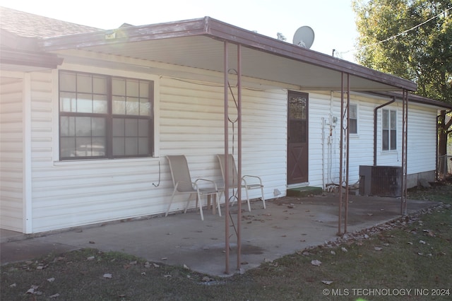 back of property with a patio area