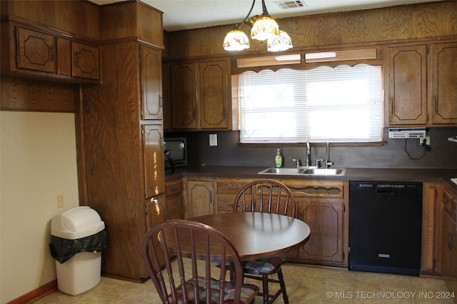 kitchen with dishwasher, pendant lighting, sink, and tasteful backsplash