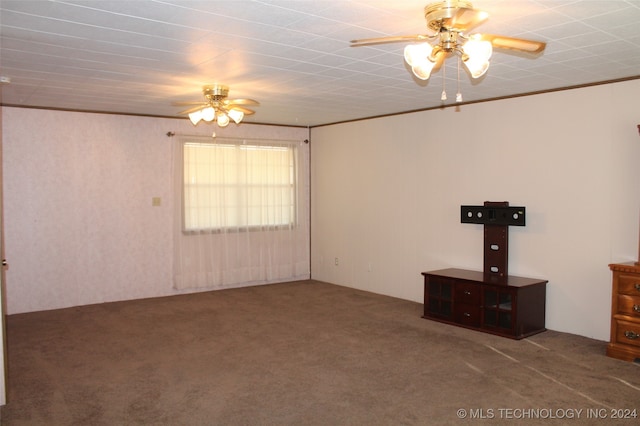 interior space with ornamental molding, carpet floors, and ceiling fan