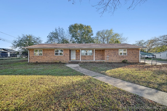 single story home with a front yard