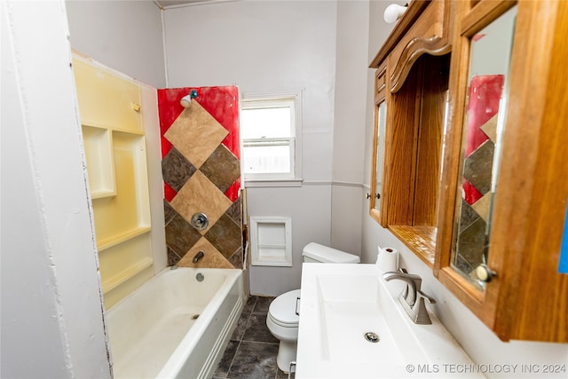 full bathroom featuring toilet, vanity, tile patterned flooring, and shower / bathtub combination