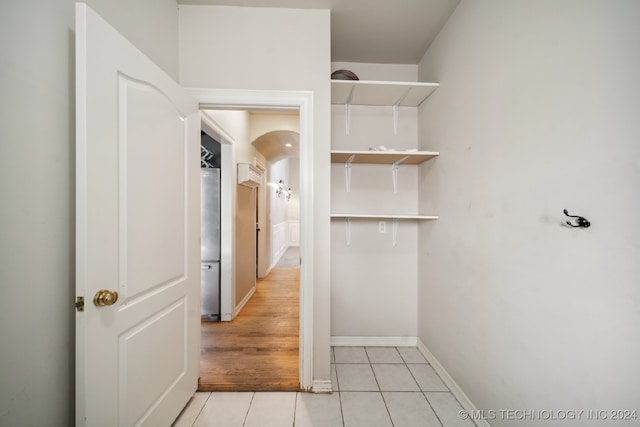 interior space featuring light tile patterned flooring