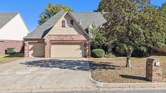 view of front of property featuring a garage