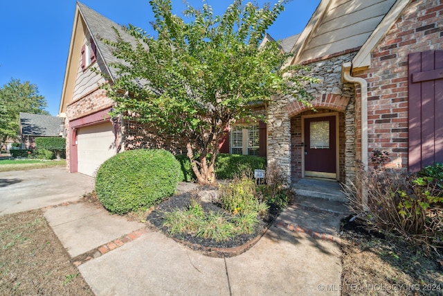 entrance to property with a garage