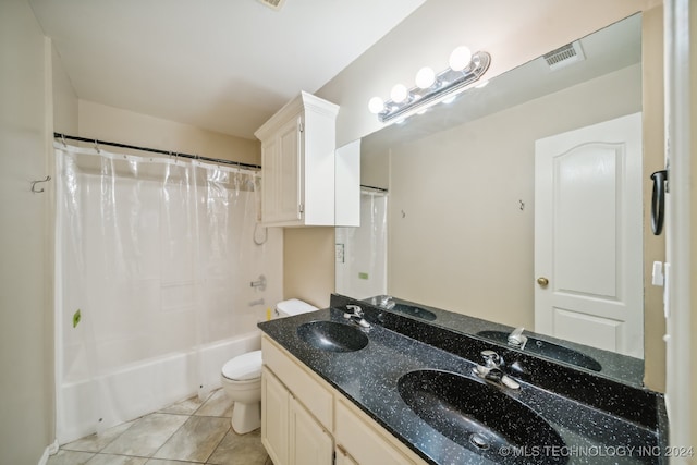 full bathroom with toilet, vanity, tile patterned floors, and shower / bathtub combination with curtain