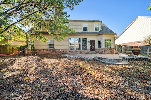 back of house featuring a patio