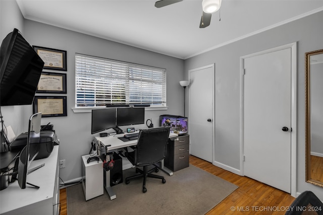 office area with hardwood / wood-style floors, ceiling fan, and crown molding