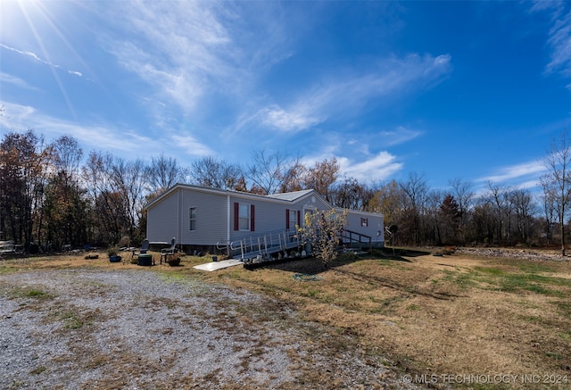 view of front of house with a wooden deck