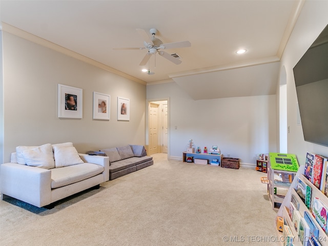 carpeted living area with crown molding, recessed lighting, a ceiling fan, and visible vents