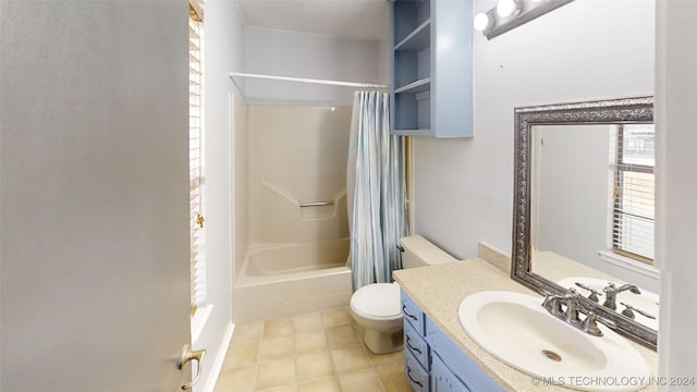 full bathroom with tile patterned flooring, shower / tub combo, vanity, and toilet