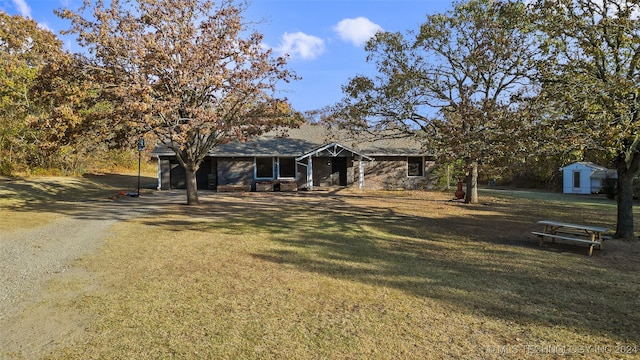 view of front of home with a front yard