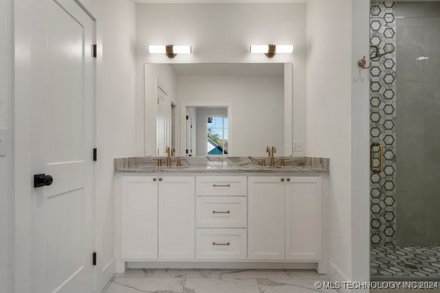 bathroom with vanity and an enclosed shower