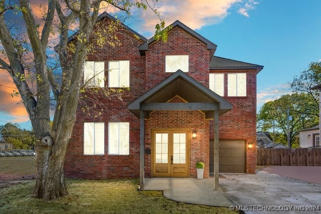 view of front of home with a garage