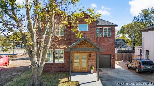 view of front of property with a garage