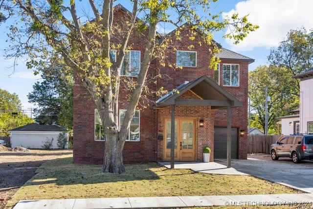 view of property with a front lawn