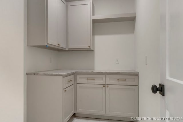 kitchen with white cabinets