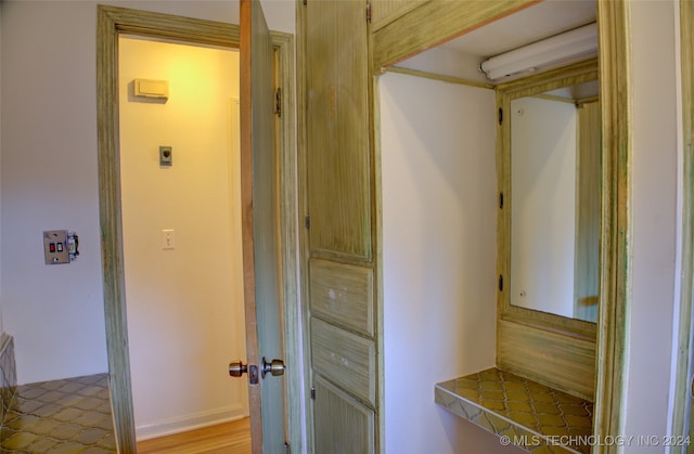 hall featuring light wood-type flooring