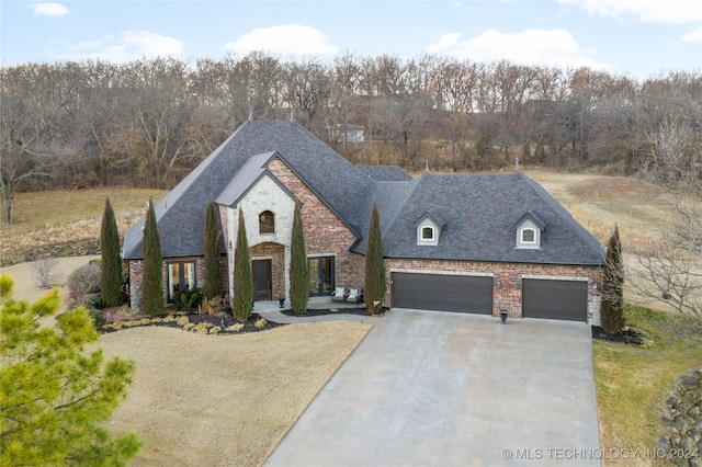 view of front of home with a garage