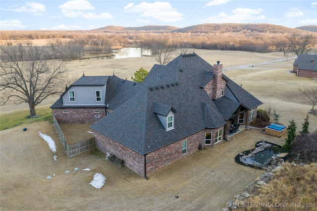 bird's eye view with a mountain view