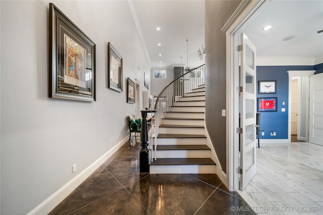 staircase with ornamental molding