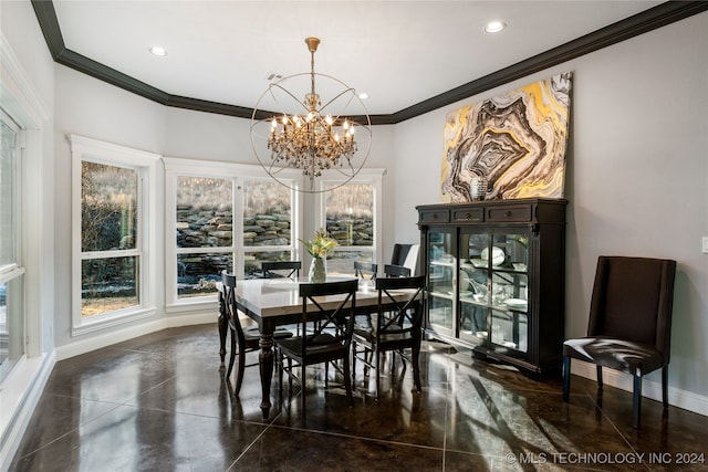 dining area with ornamental molding and a notable chandelier