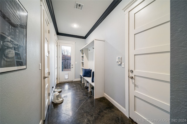 interior space with crown molding