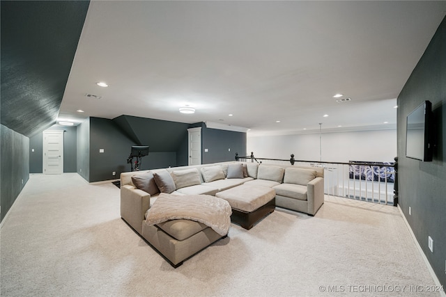 carpeted living room featuring lofted ceiling