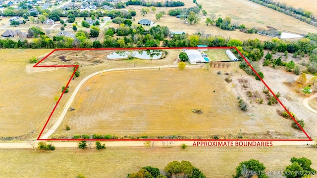 bird's eye view with a rural view