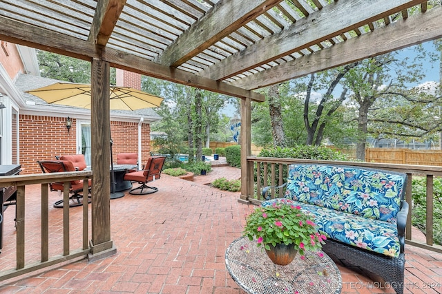 view of patio featuring a pergola