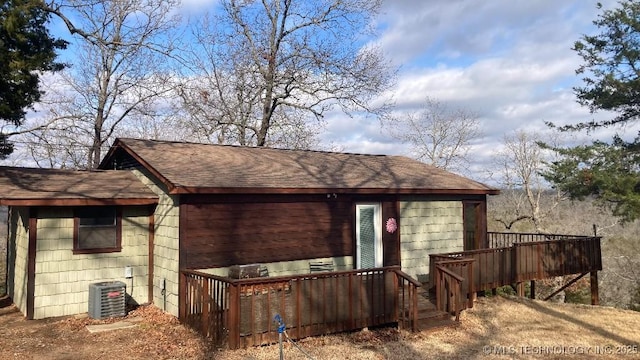 view of side of home with cooling unit