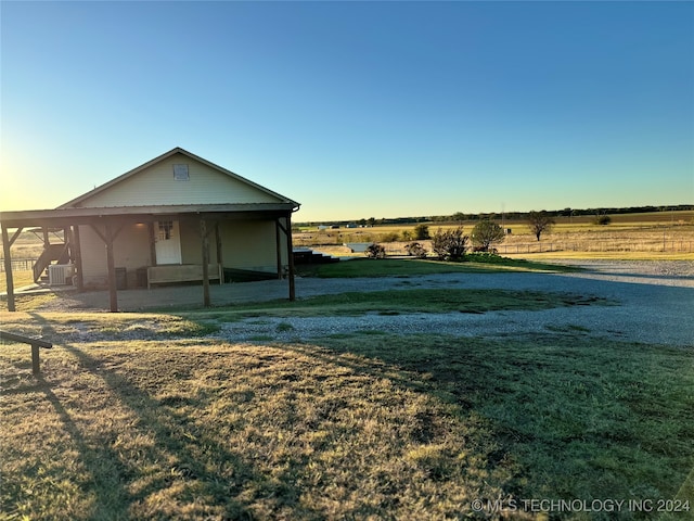 exterior space with a rural view