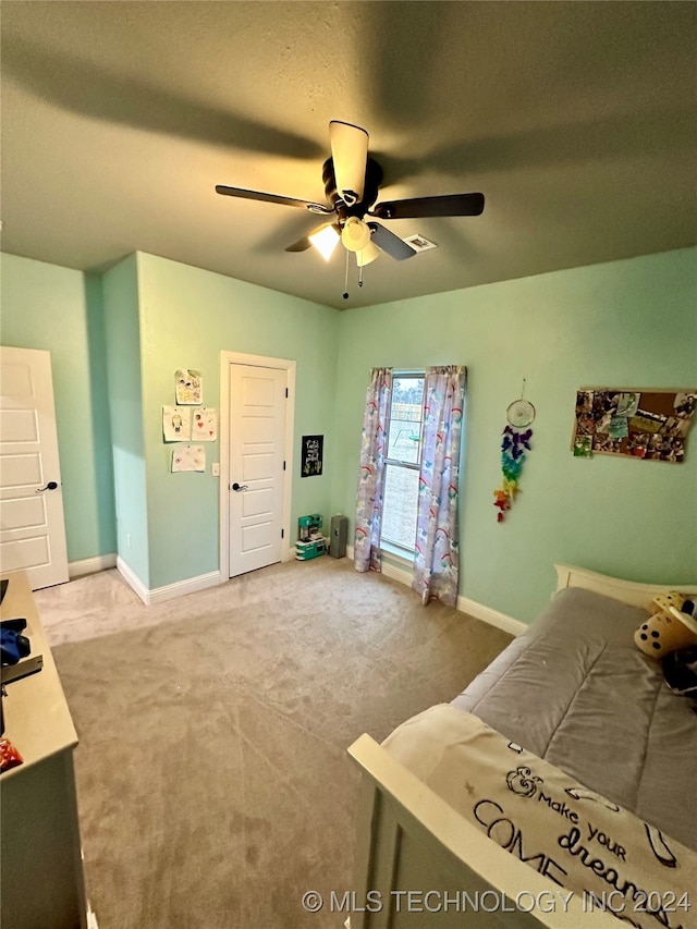 bedroom featuring carpet and ceiling fan