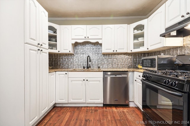 kitchen featuring stainless steel appliances, dark hardwood / wood-style floors, white cabinets, and sink