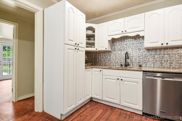 kitchen featuring dark wood-type flooring, stainless steel dishwasher, dark stone counters, and white cabinets