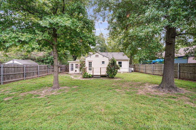 view of yard with a wooden deck