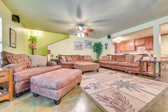 living room featuring ceiling fan