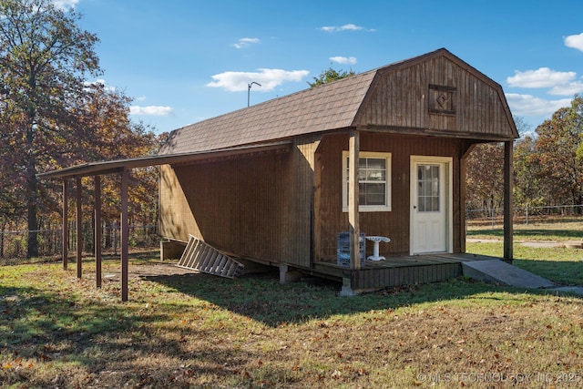 view of outdoor structure with a yard