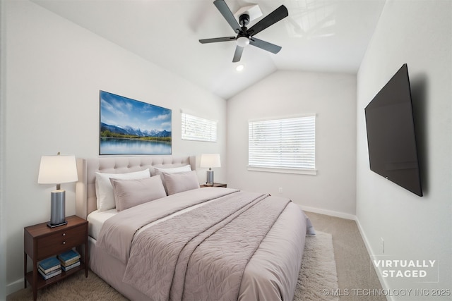 carpeted bedroom featuring ceiling fan and lofted ceiling