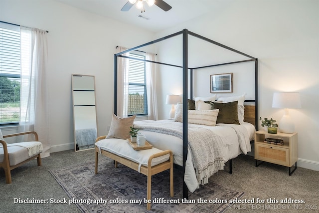 carpeted bedroom with baseboards, visible vents, and ceiling fan