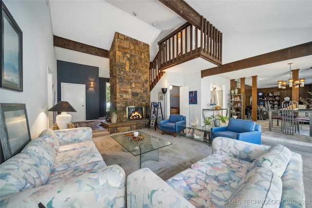 carpeted living room featuring high vaulted ceiling, ornate columns, a fireplace, a notable chandelier, and beam ceiling