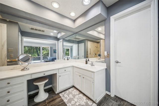 bathroom featuring hardwood / wood-style floors and vanity