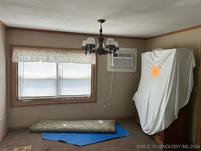 unfurnished dining area featuring carpet, a notable chandelier, an AC wall unit, and crown molding