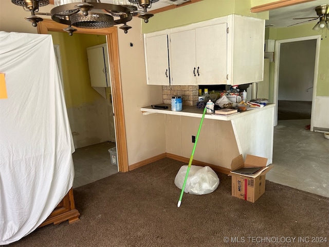 kitchen featuring ceiling fan and tasteful backsplash