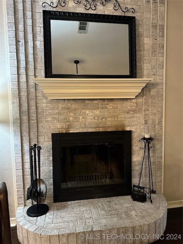 interior details with a fireplace