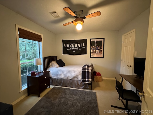 carpeted bedroom featuring ceiling fan