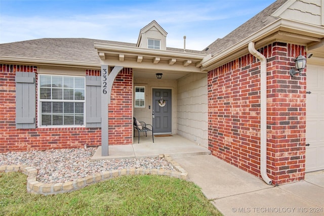 entrance to property with a garage