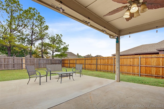 view of patio / terrace featuring ceiling fan