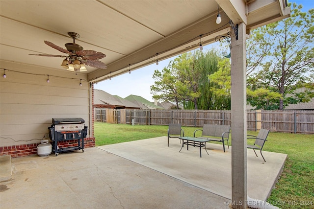 view of patio featuring grilling area and ceiling fan